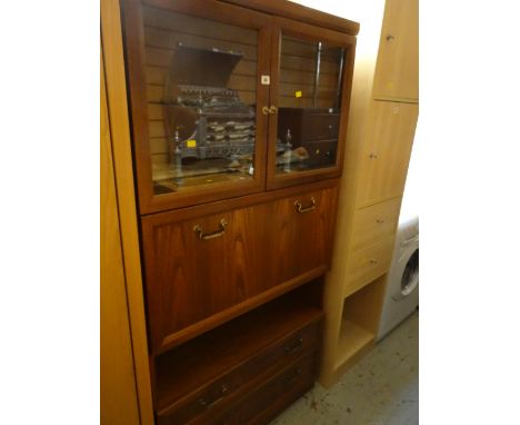 A vintage G-plan dark oak effect lounge unit