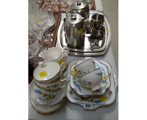 A vintage Grafton china part-teaset together with a quantity of stainless steel teaware