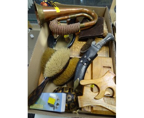 A box of various collectables including military bugle, military badges, brush set, boxed student's telescope etc