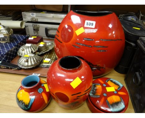 Two Poole pottery vases in 'African Sky' pattern together with a small round Poole vase & lidded potcondition report:Each pie