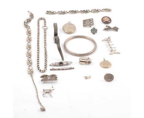 A collection of silver and white metal jewellery, a 6.3mm gauge plain silver slave bangle, Birmingham 1919; 26mm silver torto