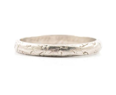 A white metal wedding band, 3mm wide D shape with leaf design pattern, ring size T, personal inscription inside band dated '4