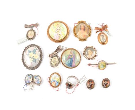 Thomas L Mott and similar painted portrait brooches and earrings, a Mott 43mm diameter brooch; another 36mm; Laughing Cavalie