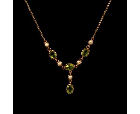 A peridot and pearl necklace and earring suite, four oval peridot and five small pearls set in a 9 carat necklace with centra