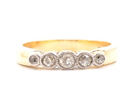 A diamond five stone ring, the old and old 8 cut stones graduating in size, millegrain set in an 18 carat yellow and white go