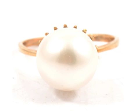 Gemporia - A white South Sea cultured pearl and diamond ring, the round pearl surrounded by eighteen small round diamonds (to