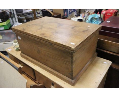 A vintage pine blanket/tool box with a hinged lid
