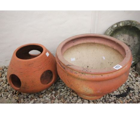 Large Circular Clay Planter and another Planter