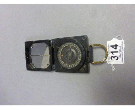 Military Issue Magnestic Marching Compass, Mark 1, Serial no. B2549438, made by T G Co Ltd (clasp a/f)
