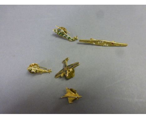 Five vintage brooches to include Wessex helicopter