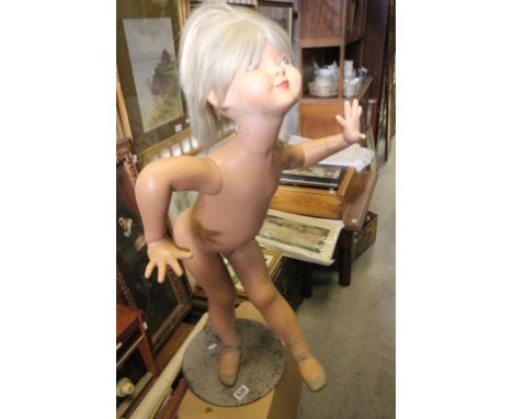 A Danish mannequin of a girl, on a metal base, by Hindsgaul 
