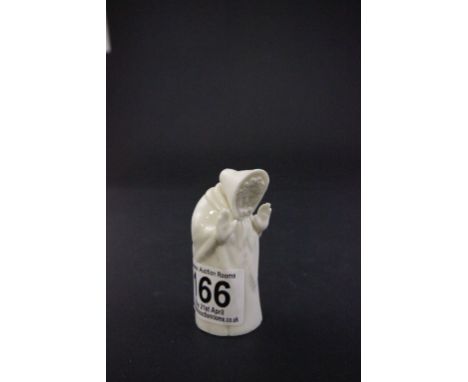 Royal Worcester porcelain candle snuffer in the form of an old lady with raised hands