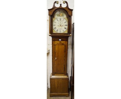 A late Georgian oak cased chiming eight day longcase clock by J. Chapman of Lincoln
The hood with gilt metal mounted swan nec