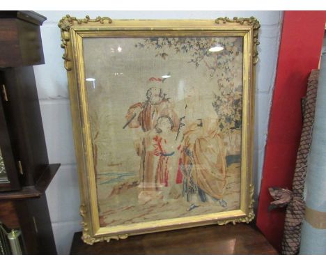 A gilt framed and glazed tapestry of three figures, circa late 19th Century (fading and worn), 60cm x 50cm 