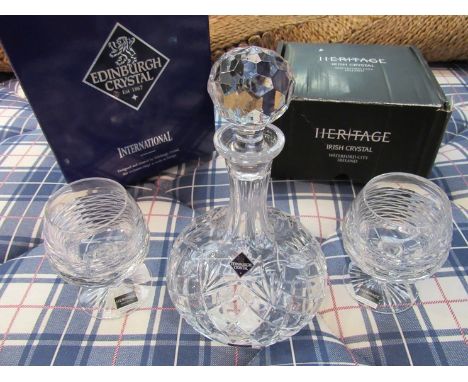 A boxed Edinburgh crystal decanter and a boxed pair of Heritage crystal brandy glasses