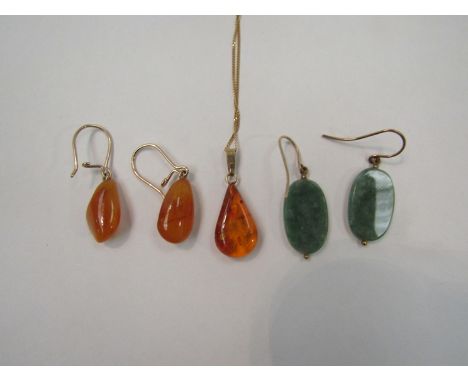 A pair of amber drop earrings, jade earrings and an amber pendant on chain
