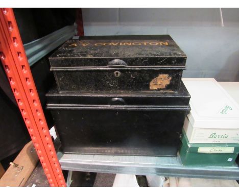 Two tin trunks and a wooden trunk