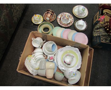 A box of mixed ceramic tea wares