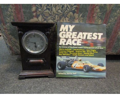 A mounted automobile clock by Smiths Cricklewood Works, London . No P554.591 and "My Greatest Race" motor sport book by Adria