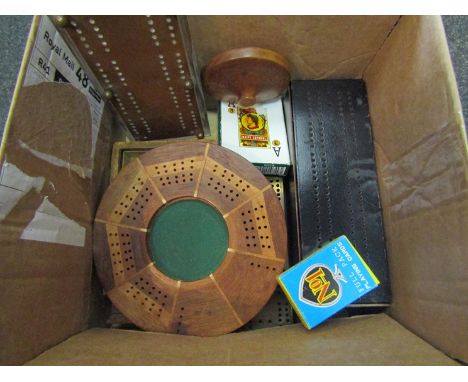 A set of dominoes with cribbage board top, three further cribbage boards, copper and Perspex, brass and treen, etc