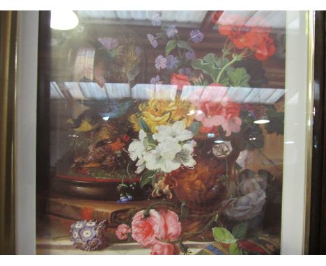 A lithograph after John Wainwright (act 1860-1869) of an urn of flowers on a marble topped table beside antiquarian books and