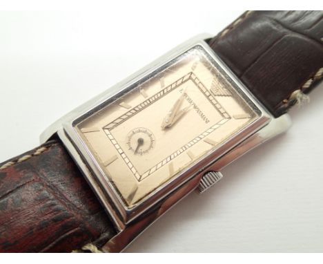 Gents Emporio Armani wristwatch on leather strap  CONDITION REPORT: This item was NOT working at lotting. 