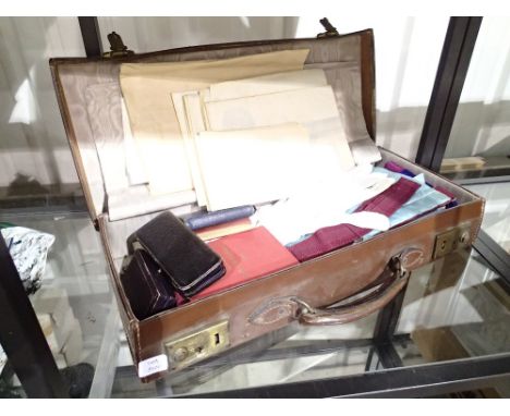 Vintage leather briefcase with masonic bombay lodge inscribed and related paperwork including hallmarked silver medal 