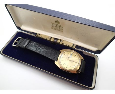 Vintage Garrard day date automatic gold plated wristwatch in original box (please see condition report) CONDITION REPORT: Thi