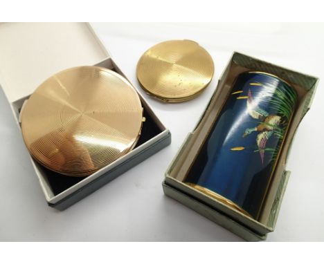 Two vintage compacts Kigu and Stratton and a decorative perfume container 