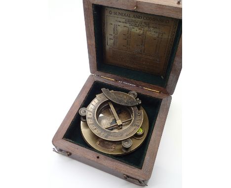 Boxed brass sundial compass marked JH Steward