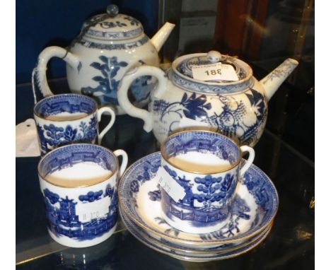 A SMALL CHINESE BLUE AND WHITE TEAPOT another similar  and three coffee cans and saucers