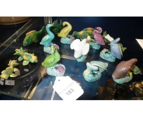 A COLLECTION OF CHINESE CERAMIC BIRD AND FISH ORNAMENTS