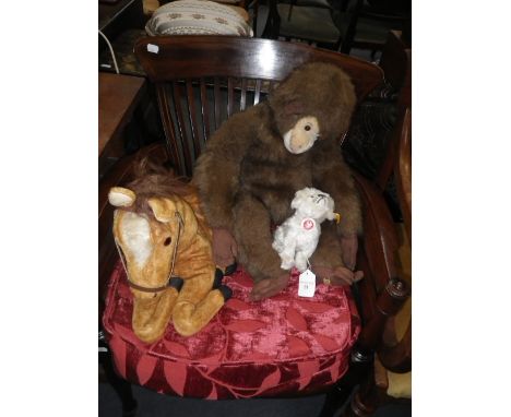 STEIFF: A PLUSH DOG 'Mopsy' with tag, a Vintage Merrythought gorilla and a plush horse pyjama case (3)