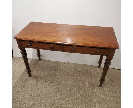 A two drawer mahogany writing desk/console table, 120 x 73 x 50cm.