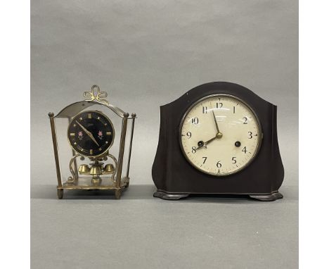 A Bakelite Smiths mantel clock, H. 19cm. Together with a Schatz torsion clock.