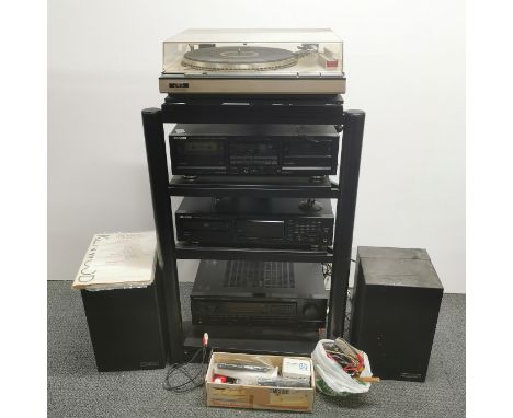 A Kenwood sound system with a Mission Electronics model 70 MK II pair of speakers and a JVC record player on a metal unit. Ke