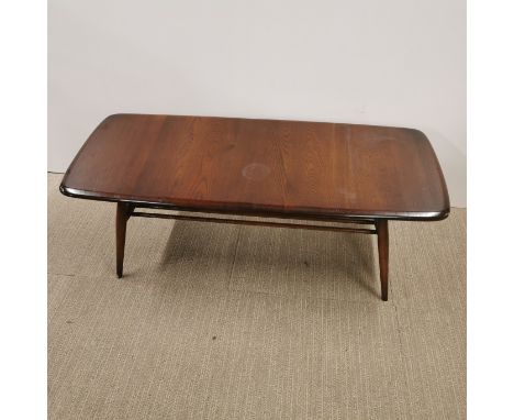 An Ercol stained elm coffee table, 105 x 43 x 36cm.