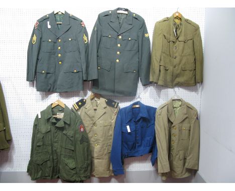 Seven Assorted Post War United States of America Army Tunics and Blouses.