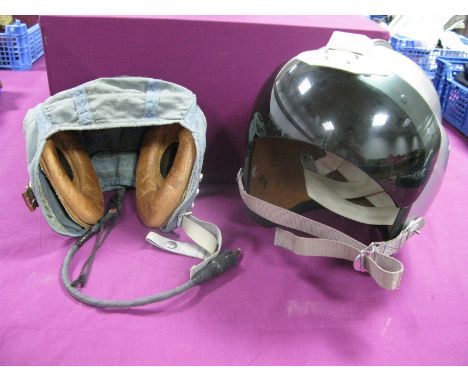 A 1960's English Pilots/Air Crew Helmet with Sun Visor by Helmets Ltd of Wheathampstead, finished in silver. Plus the carcass