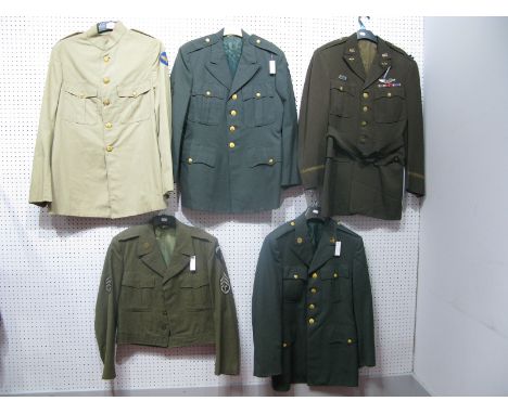Five United States Army Tunics, Airborne and Pilots Badges, noted.