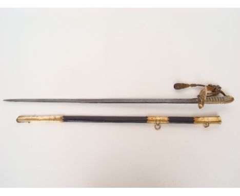 A late Victorian Royal Navy officers sword, with single fullered 80cm etched blade, with gilt metal guard, shagreen grip, lio