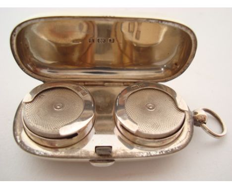 A late Victorian silver double sovereign case, Birmingham, 1901, makers mark rubbed, of oval form with suspension loop, engin
