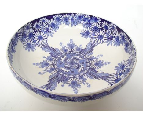 A large Royal Doulton blue and white was basin, Daisy Pattern Rd No. 374874, small repair to rim, 37.5cm diameter. 