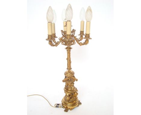 A late 19th Century French gilt bronze seven light candelabra, later fitted for electricity, 78cm high. 