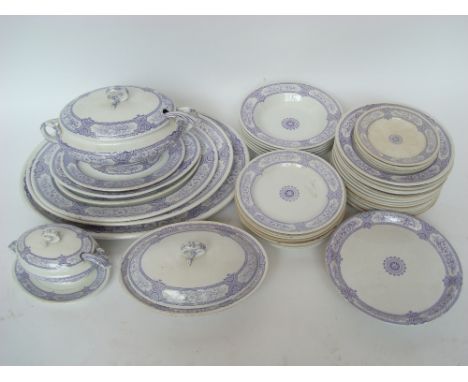 An extensive 19th Century Ashworth ironstone Lucerne pattern part dinner service comprising fourteen dinner plates, eight med