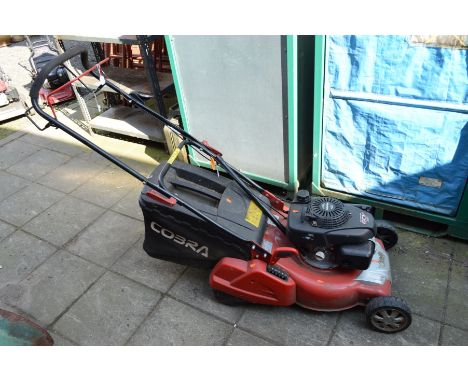 A COBRA RM46SPH SELF PROPELLED REAR ROLLER PETROL LAWN MOWER, fitted with a Honda engine and grass box (tested and working)