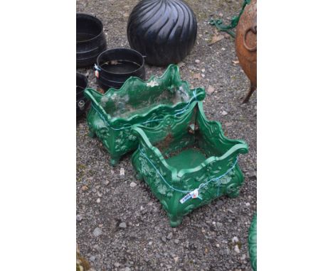 A SQUARE PAINTED ALUMINIUM GARDEN PLANTER with foliate decoration together with a similar rectangular planter (2)