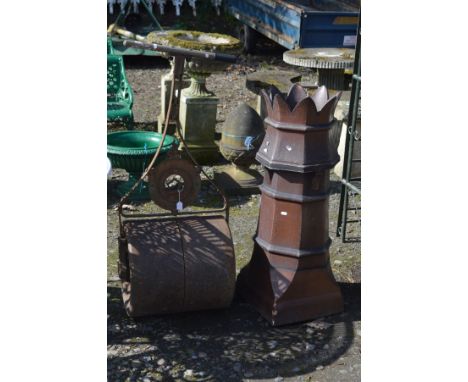 A VICTORIAN SALT GLAZED CHIMNEY POT with an outsplayed top, height 98cm together with a victorian cast iron garden roller (al