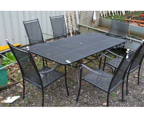 A METAL GARDEN TABLE, width 190cm x depth 105cm x height 73cm, together with a set of six armchairs with lattice back and sea