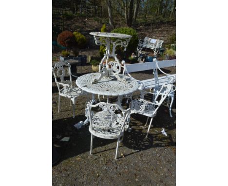 A PAINTED ALUMINIUM GARDEN TABLE on a triple scrolled framed legs united by an under shelf, diameter 95cm x height 72cm, toge